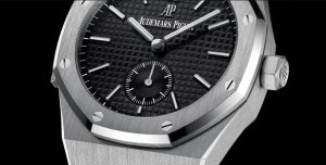 The 42 mm fake Audemars Piguet Royal Oak 26591PT.OO.D002CR.01 watches have black dials.