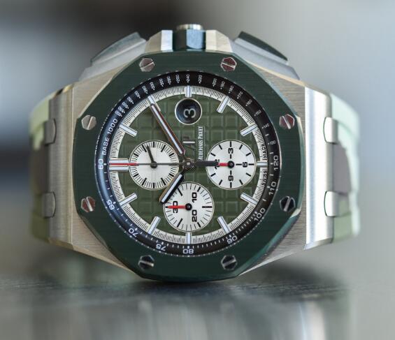 The white sub-dials are contrasted to the green dial.